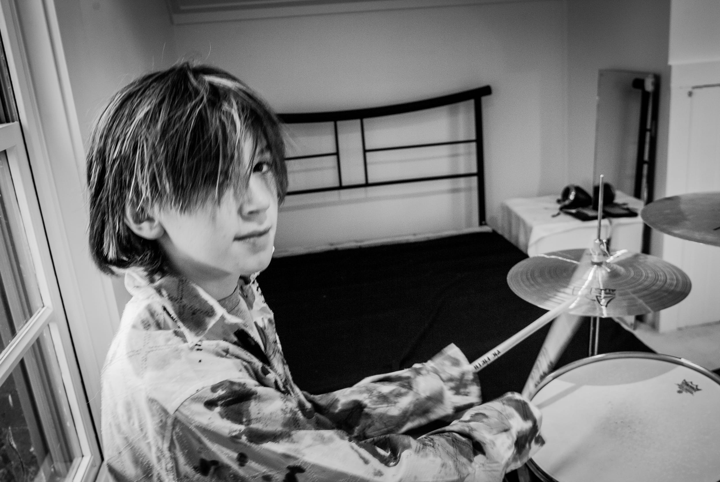 Bespoke lifestyle portrait of a family enjoying a peaceful moment together, styled in a unique way to capture their special connection.