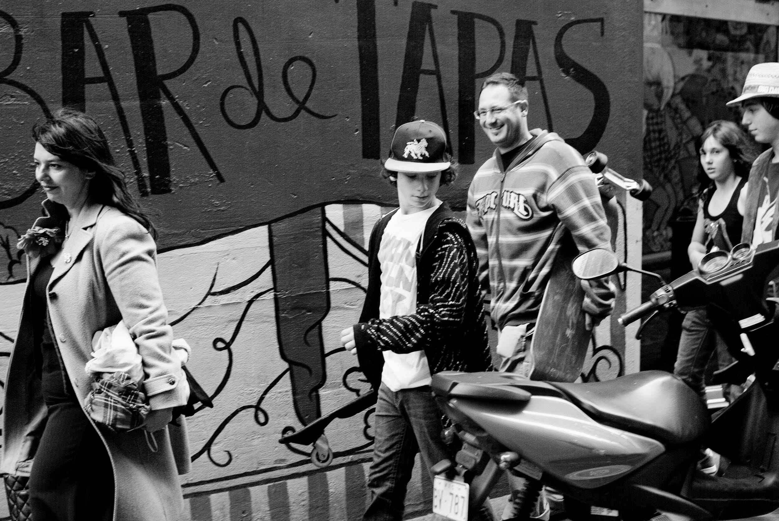 Bespoke lifestyle portrait of a family enjoying a peaceful moment together, styled in a unique way to capture their special connection.