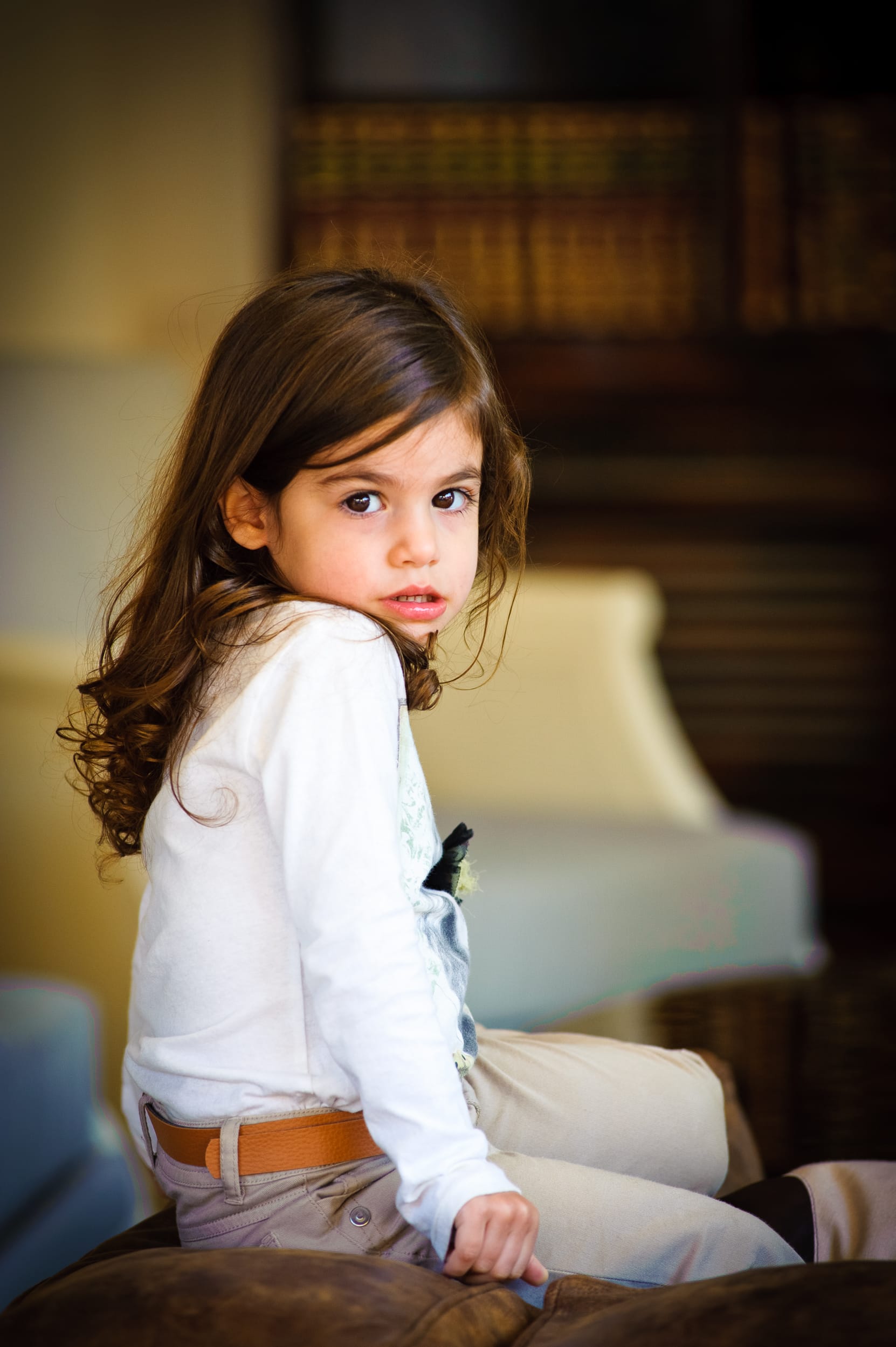 Bespoke lifestyle portrait of a family enjoying a peaceful moment together, styled in a unique way to capture their special connection.