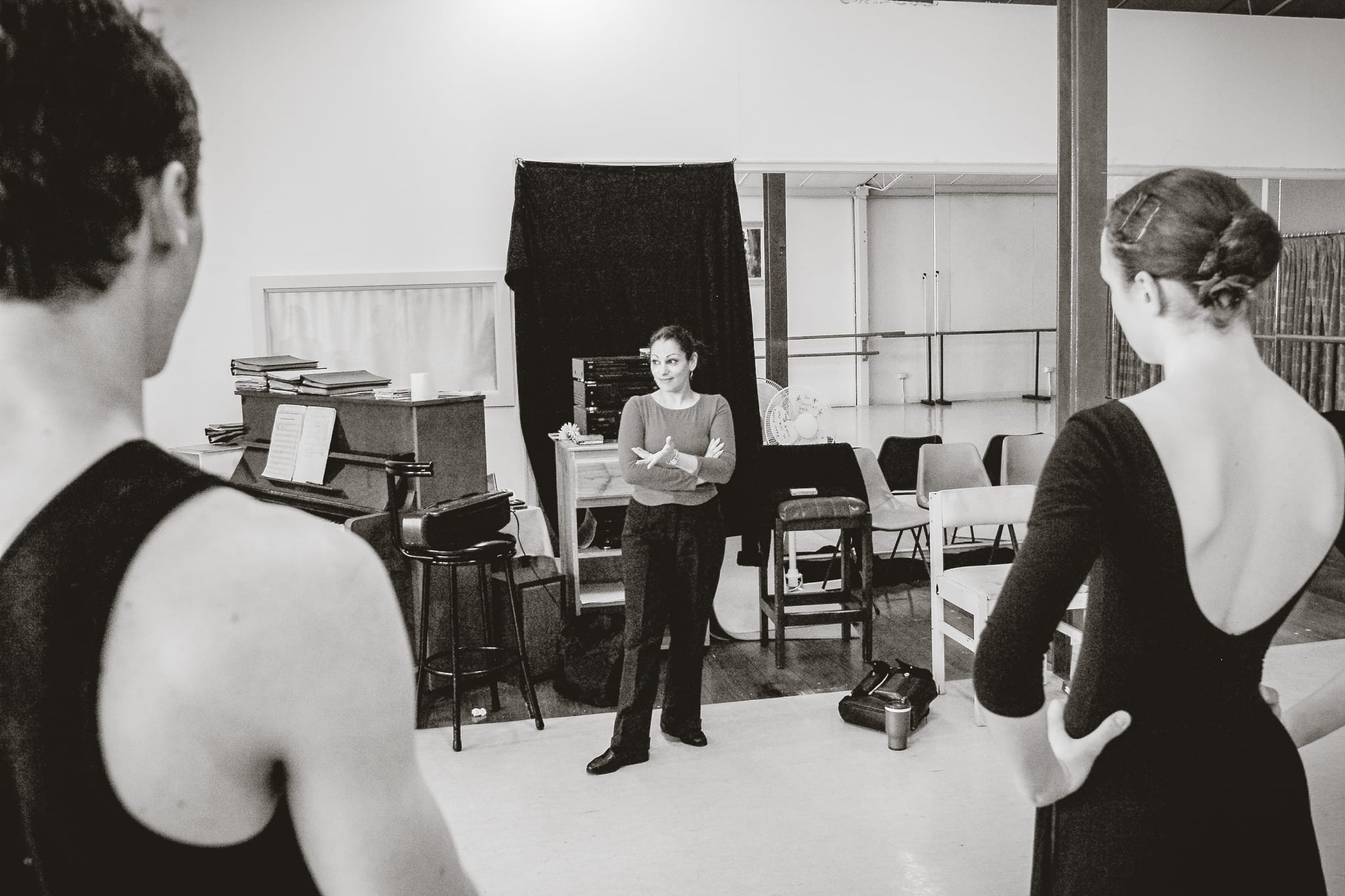 Dance instructor in class, captured by Arnold Szmerling for the Visual Life Collection, highlighting the theatrical artistry of stylized national dance.