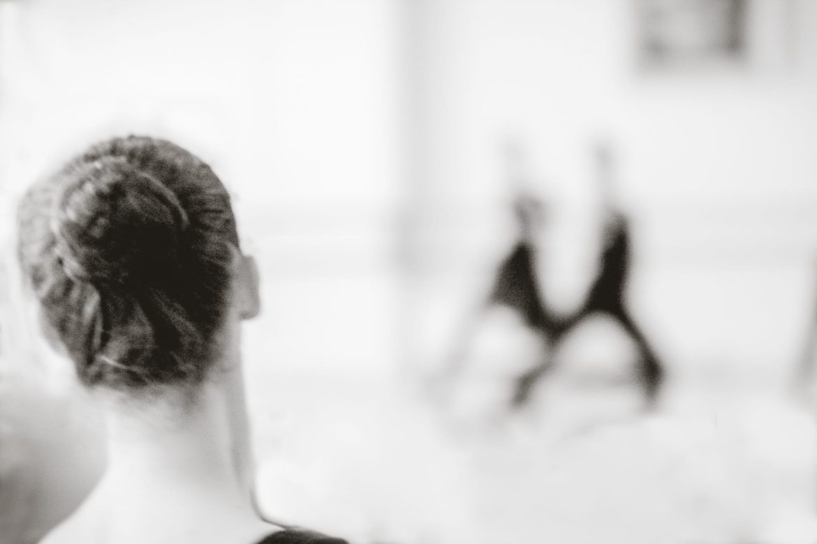 Ballet students during a dance class; figures watching and being watched. Dance School, limited-edition photograph by Arnold Szmerling.