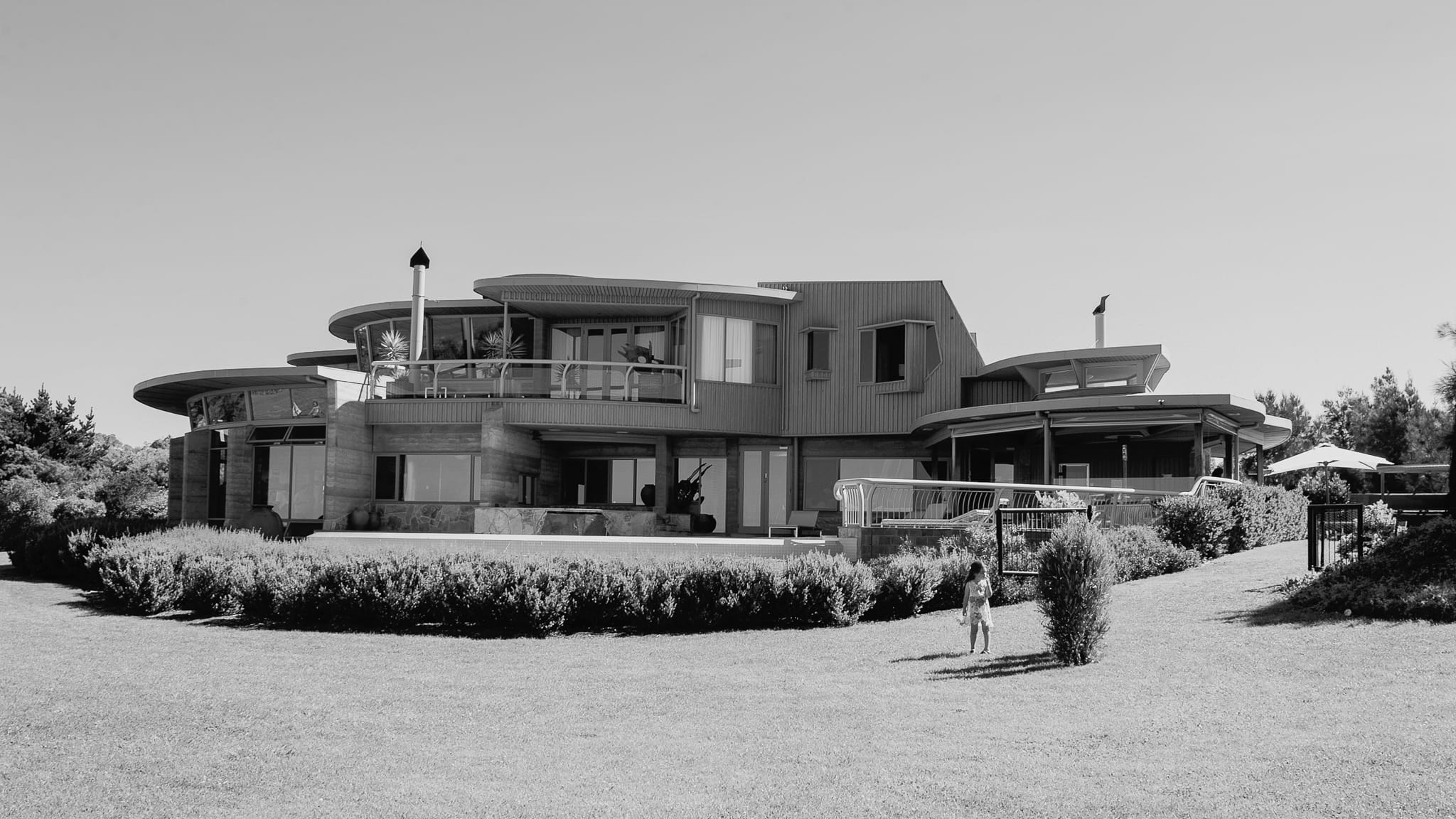 Elegant family retreat portraits during private residency session in Melbourne – legacy documentation by Arnold Szmerling