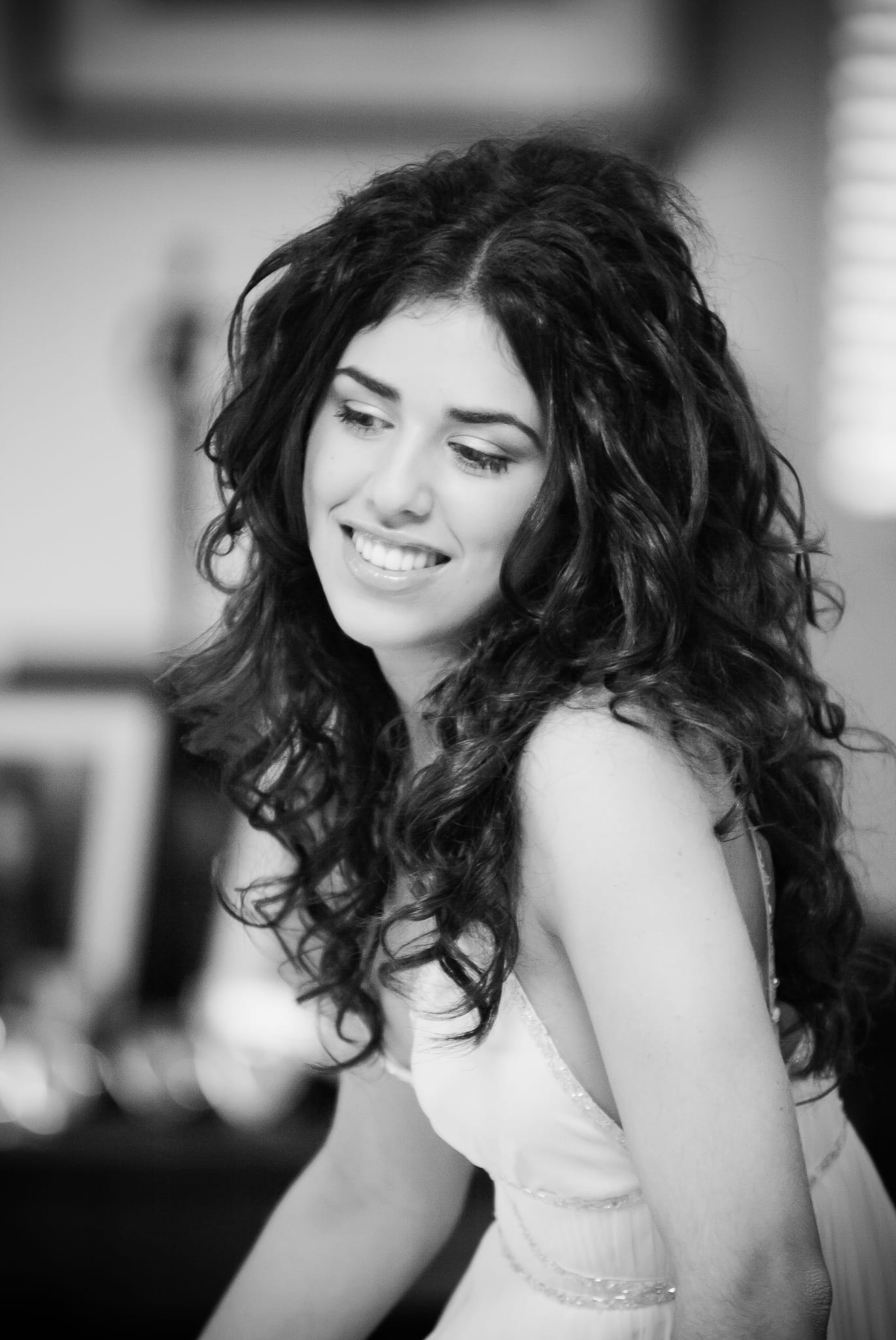 Radiant black-and-white debutante portrait with a captivating smile – Melbourne legacy moment by Arnold Szmerling