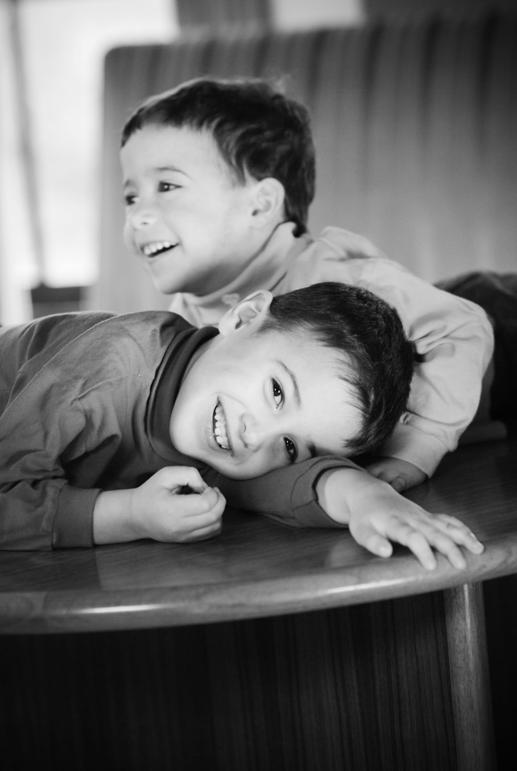 Two young twin boys and home having fun, Melbourne, Australia, captured with natural light for the 2026 Founder’s Residency by Arnold Szmerling.